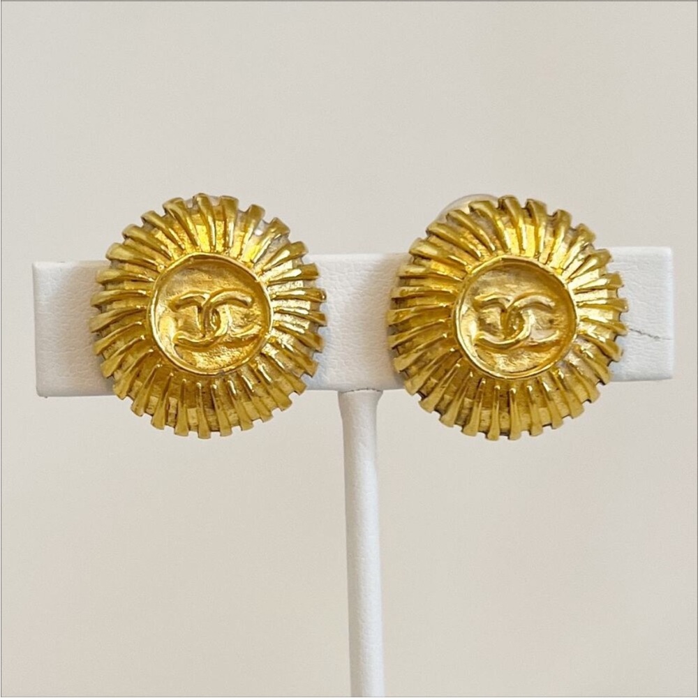 CHANEL Gold plated Sunburst clip on Earrings